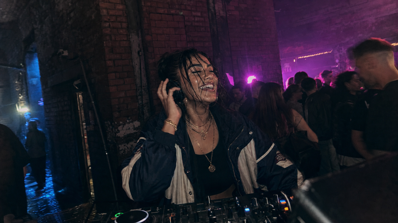 Manchester DJ performing in a small club